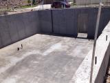 Basement Floor under Living Room and Kitchen, viewed from back 2