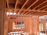 Standing in Kitchen viewing music room on left and entrance hallway on right