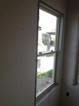 Close up of metal strip around window frames side angle, this is the office