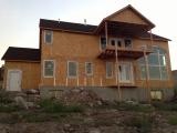 Back view of house - this looks like a big house!  We still need to have the columns set to the outside of the deck in line with top deck, this should be done in the next week.