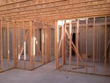 Framed Basement looking into section under Stairwell and Music Room