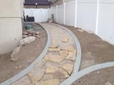 Pathway to left side of house