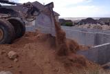 Earth Mover Working the Dust