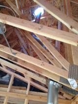 Heater flue in master bedroom going out top of roof